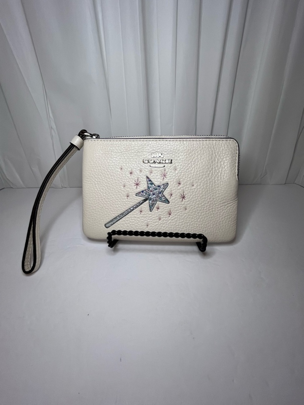 Coach White Pebbled Leather Wizard of Oz Wristlet with Star Wand Motif